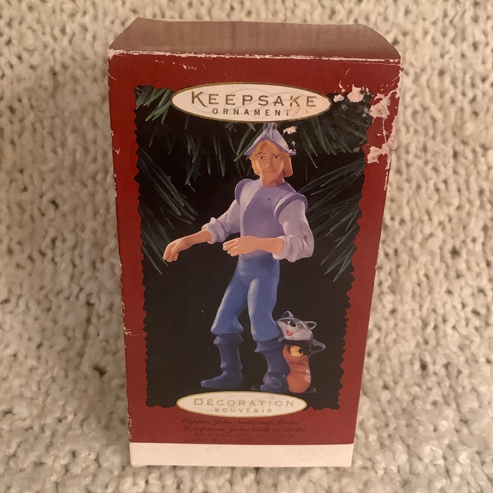 Hallmark Keepsake ornament of Captain John Smith and Meeko.